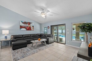 Modern living room with plush seating and natural light for ultimate comfort.