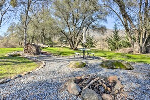 House Exterior | Shared Fire Pit & Picnic Table