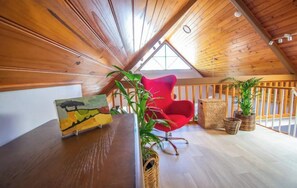 Mezzanine with original artwork and funky chairs
