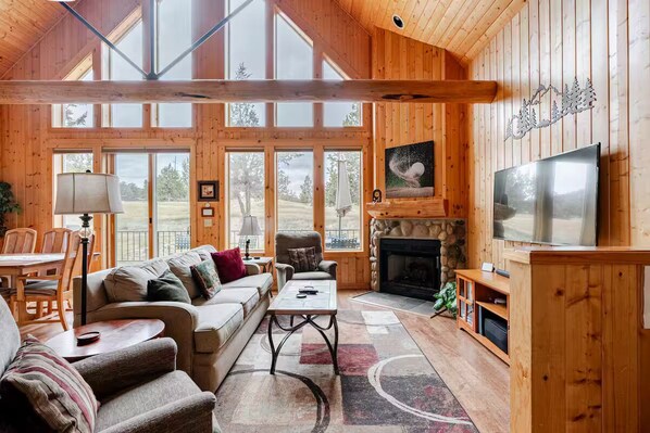 Living room has lots of natural lighting.