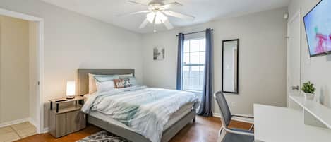 This queen bed room includes a closet with desk/chair and Smart TV!  