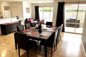 Stylish central dining with direct access to the kitchen