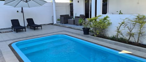 Open Veranda with view on swimming pool