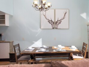 Large dining table off the main room and kitchen