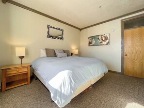 Step into this elegantly designed bedroom where comfort meets style. The plush Queen bed, complemented by lovely floral artwork, creates a soothing retreat. Enjoy the ample space and inviting atmosphere for a perfect night's rest. (Bedroom #2)