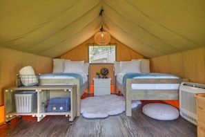 Glamping tent also contains ac/heater and kitchen supplies