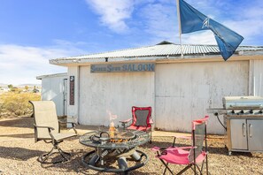 Our on-site Silver Spur Saloon, relax by the firepit