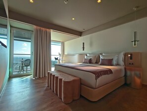 Large bedroom with balcony.