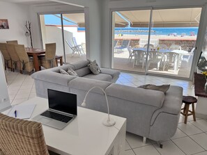 Sea view from both the living room and dining area.