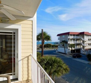 Relax on your private balcony and soak up the coastal breeze