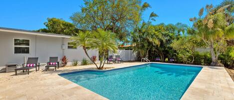 Enjoy the large pool offering sun all day long