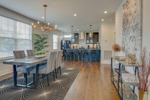 Dining room table with adjacent island seating.  