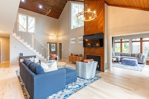 Living room with views of sunroom