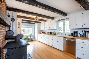 The beautiful beams have watched more meals prepared in this kitchen than most.