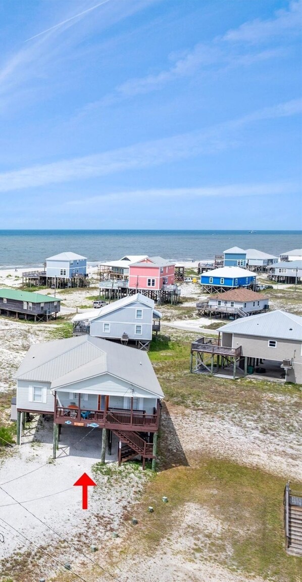 Spacious home located just steps away from the sand