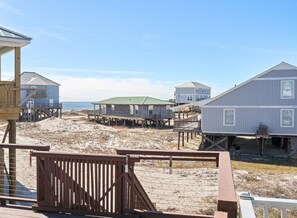 Back deck of home looks at the Gulf.   Gate that closes