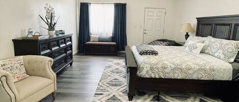 Spacious bedroom with king bed and room for queen size air bed (upon request)