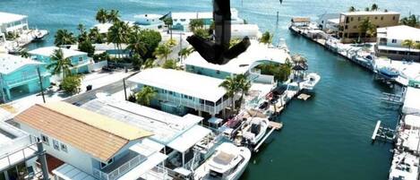 Aerial view of the house , only 4 houses away from the open ocean.