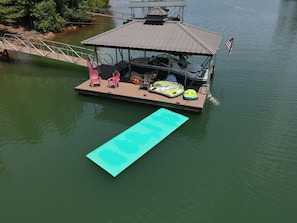 Dock and toys for use. (Boat slip is occupied, watercraft not rentable.)