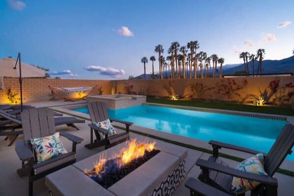 Poolside serenity with mountain views.