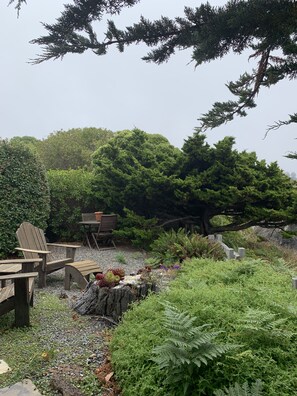Private patio with dining table and chairs