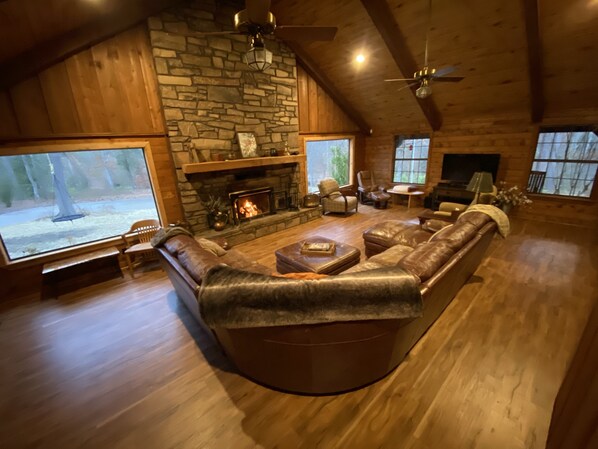 Gather your family around this massive fireplace and views of Piney Woods