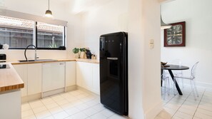 Fully equipped kitchen with separate eating area