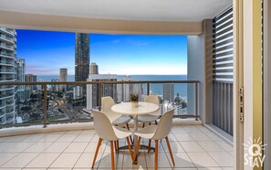 Balcony with the gorgeous views of the ocean and the city 