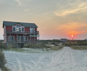 View of back of the house during sunset.