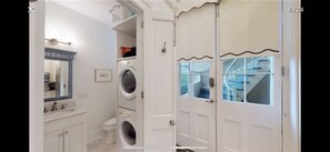 Bathroom has washer and dryer