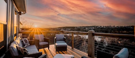 Enjoy a beautiful sunset over Table Rock Lake on the top deck