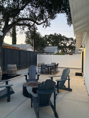 Gas BBQ and Fire Pit with conversation area seating.