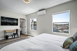 Business or leisure? Why not both? ️ Our one-bedroom studio includes a dedicated workspace for all your work needs!