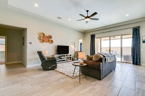 Large, bright family room with double sliding door access to patio and backyard