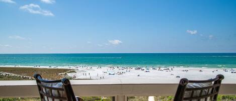 Relax on the balcony with your morning coffee watching the waves roll in