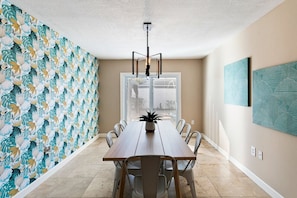 Gather 'round for laughter, good food, and cherished moments. Our dining room: where every meal becomes a celebration!