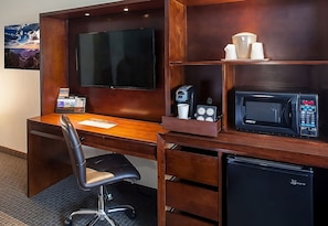 This unit comes with a flat screen TV, refrigerator, coffee maker and a microwave!