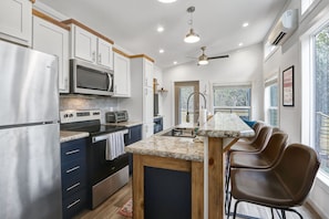 Full kitchen with bar seating