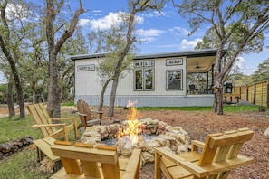 Side view of the tiny house from the fire pit