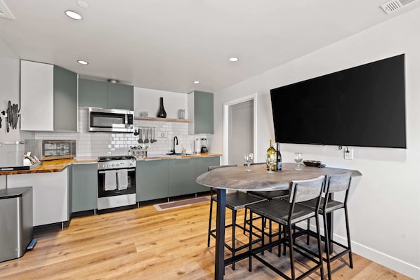 Open floorplan allows you to freely flow from the kitchen, to the dining area, and living room.