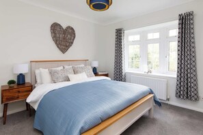 The inviting downstairs king room is beautifully decorated.