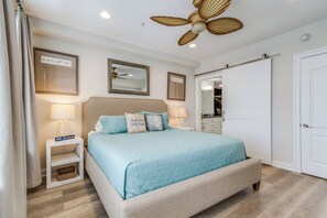 Master bedroom with king size bed and master bath.