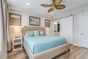 Master bedroom with king size bed and master bath.