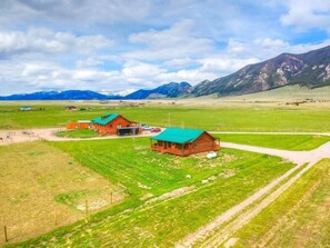 Amazing views from both the front & back covered porches. Horses are often in the back pasture!