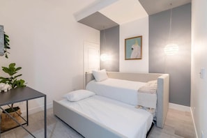 Second bedroom (Den) | Trundle Beds (Twin Size Each) | Memory Foam Mattresses