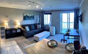 The living room has a sofa bed to accommodate two additional people.