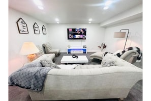 Living Room | 65" Smart TV | Netflix included