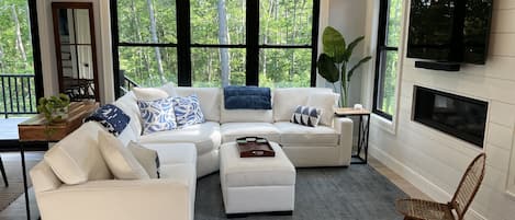 Cozy living room with plenty of sunlight 