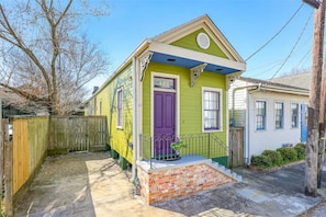 Your adorable historic shotgun house with off-street parking space awaits!