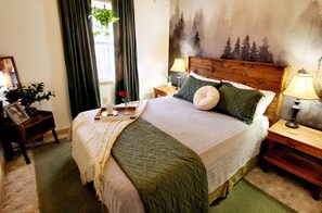 Bedroom 1 features a queen size bed and black out curtains.